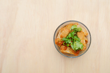 Stewed fried fishcakes bowl with copy space