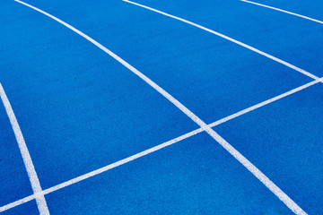 Photo of blue stadium tracks