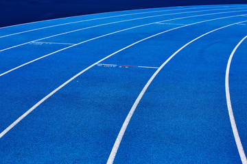 Photo of blue stadium tracks