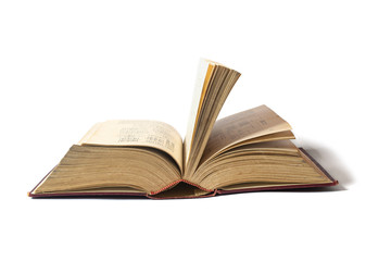 Open old book isolated on white background
