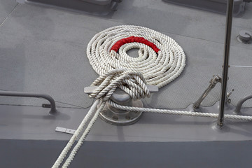 new anchor rope on a boat deck as an industrial background