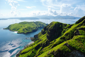 landscape with mountains and clouds and sea