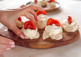 Pavlova dessert, the meringue with strawberries