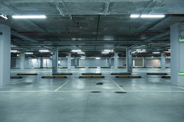 Horizontal image of empty underground parking lot