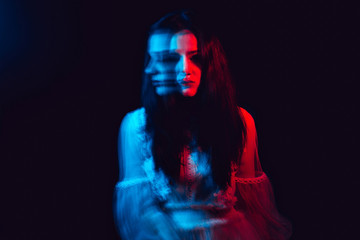 portrait of a crazy mentally ill girl paranoid with mental disorders