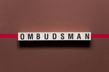 Ombudsman word concept on cubes