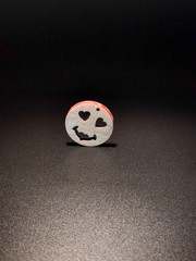 Funny smiley face on a black background.