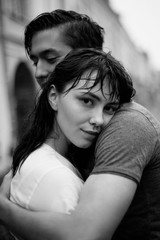 Hugging loving boy and girl outside