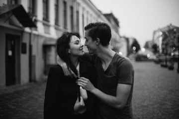 Hugging loving boy and girl outside