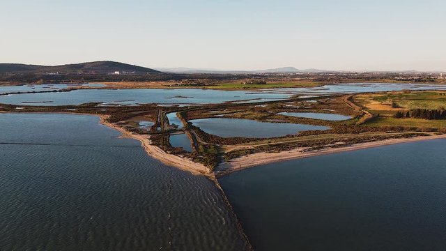 &Eacute;tang de Vic coastline at sunset, drone point of view, Vic la Gardiole, Languedoc-Roussillon, France, Europe.