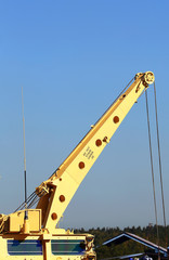 Working boom with rope suspension