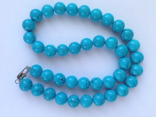 Natural stone beads: turquoise.  Women's jewelry. Turquoise beads of a soft blue color.