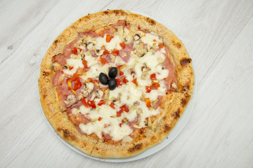 pizza with peppers and mushrooms, sesame and olives