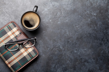 Office desk table with notepad and coffee