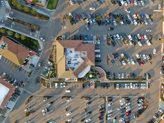 Aerial top view of typical small town shopping center with big parking for car. Rancho Penasquitos,...