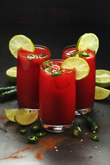 Jalapeno tomato margarita cocktail with lime