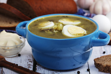 A bowl with homemade sorrel soup	