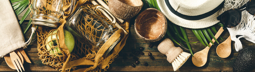 Zero waste, shopping or travel concept. Textile eco bags, glass jars and eco friendly products on...