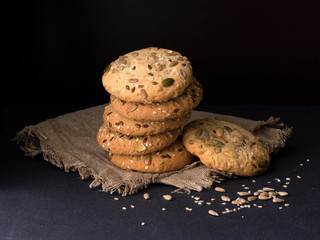 cookies with seeds on a wooden board.
