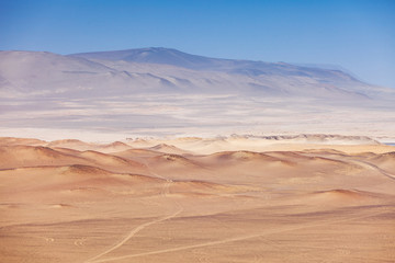 Fototapeta na wymiar View of the endless desert of Paracas National Reserve, dunes, sands. Peru.