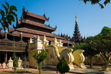 Shwe In Bin teak monastery with intricate detailed wood carving. Mandalay, Myanmar (Burma)