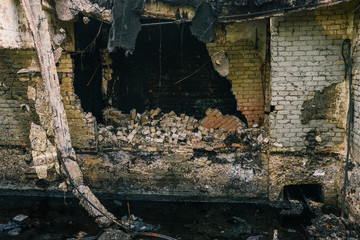 Old destroyed underground oil storage. Ecological disaster, oil spill in nature.