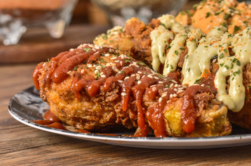 Crispy Fried chicken with sauces and spices 