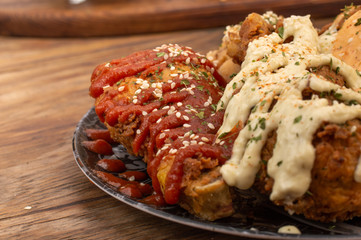 Crispy Fried chicken with sauces and spices 