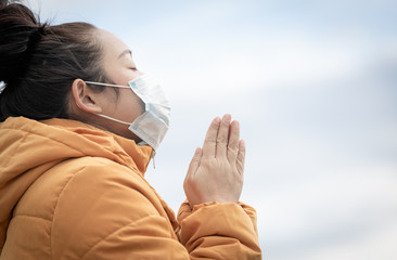 The image of a young Asian woman wearing a mask to prevent germs, toxic fumes, and dust. Prevention...