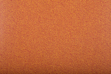 Carpet covering background. Pattern and texture of peach colour carpet. Copy space