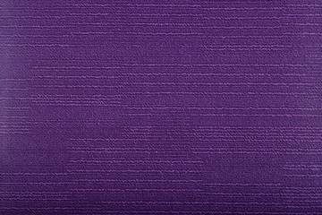 Carpet covering background. Pattern and texture of purple colour carpet. Copy space