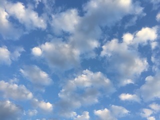 blue sky with puffy clouds