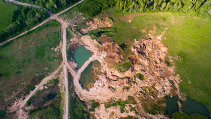 water, hills and roads from a bird 's eye view
