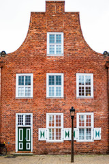 Facade of old building in the Dutch Quarter in Potsdam, Germany