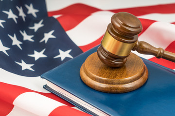 Gavel judge, book of laws on the flag of usa america. Concept crime and punishment law court