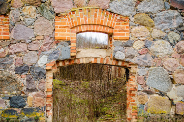 Old ruined brick building in gloomy weather
