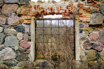Old ruined brick building in gloomy weather