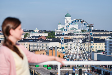 View of the Ferris wheel, the Helsinki Cathedral from the deck of the cruise ferry.