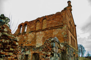 Old ruined brick building in gloomy weather