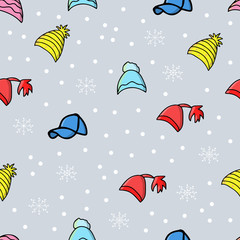 Vector background. Seamless pattern with winter hat. Warm winter hat in doodle style. Vector hand drawn illustration