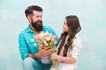 happy father got gift on fathers day. 8 March. International Women Day. dad congratulate small girl...