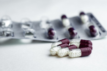 coronavirus tablets from coronavirus pharmaceuticals antibiotics medicine tablets /colorful antibacterial tablets on white background /medicine capsule tablets