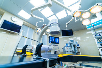 Modern equipment in operating room. Medical devices for neurosurgery. Background. Operating theatre. Selective focus.