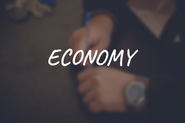 Economy word with blurring business background
