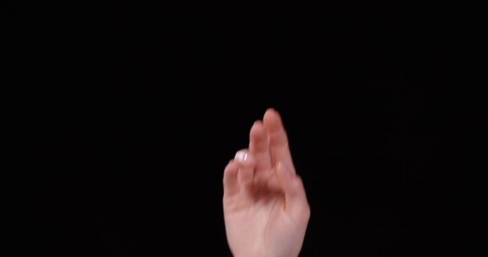 Woman showing H letter on black background, closeup. Sign language