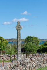 Celtic cross at sunny day in Iona Abbey, Scotland