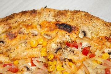 A healthy and delicious vegetable pizza made with cheddar and mozzarella cheeses
