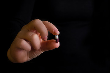 tablets in hand from pharmaceuticals antibiotics medicine tablets / colorful antibacterial tablets /medicine capsule tablets