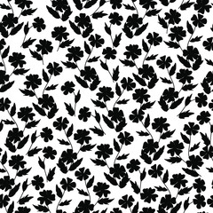 Fototapeta na wymiar Trendy black and white vector texture. Monochrome floral seamless pattern. Fashion, fabric, ditsy print, wallpaper. Hand drawn silhouette wild flowers and leaves scattered random on white backgroud