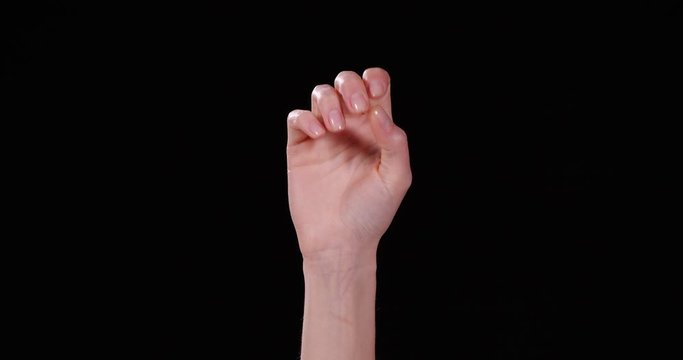Woman showing S letter on black background, closeup. Sign language